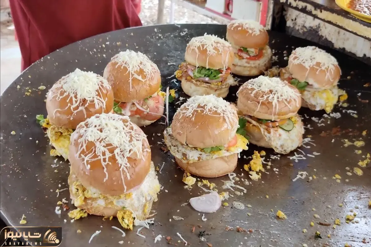 برگر خوشمزه خیابانی؛ دورگرد رو گاری برگر میده با تاپینگ تخم مرغ از مک دونالد خوشمزه تر