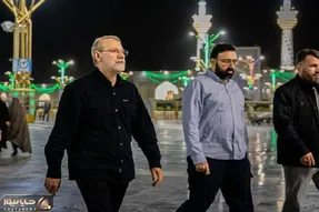 تصویری دیده نشده از پیکر شهید علی لاریجانی  و فرزندش در معراج شهدا
