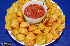 آموزش آشپزی؛ طرز تهیه پکوره کچالوی لذیذ وخوش طعم از آرد ساده