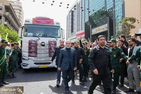 تصویری جالب از عراقچی در مراسم تشییع امروز