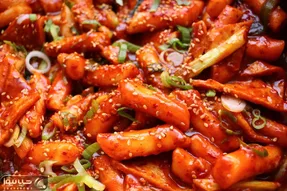 طرز تهیه دوکبوکی کره‌ای؛ خوشمزه‌ترین اسنک خیابانی که نمی‌تونید ازش دل بکنید!