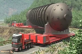 جا به جایی های غول پیکر؛ دوتا اسب تریلی جلو و عقب یه برج قد میلاد رو سر پیج می پیچونن