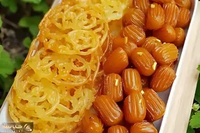 پیشنهاد سرآشپز؛ زولبیا بازاری بدون نشاسته گل، ماست و مخمر + شربت بار