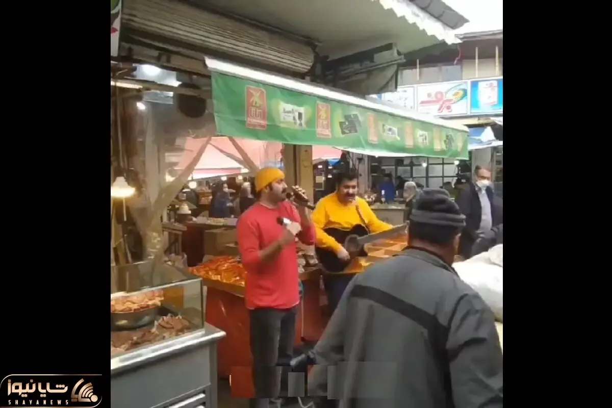 آواز خیابانی؛ ببینید گس بند چطور وسط بازار تو هوای بارونی آهنگ چرخش یک رقص رو میخونن