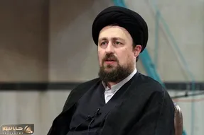 (عکس) تصویری تاریخی از حسن خمینی و فیدل کاسترو در راهپیمایی در کوبا در سال ۲۰۰۱