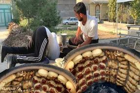 غذای ازبکی؛ کوسا ساموسا نون شکم پر ازبکی ها که توش پر دنبه است و خیلی خاطرشو میخوان